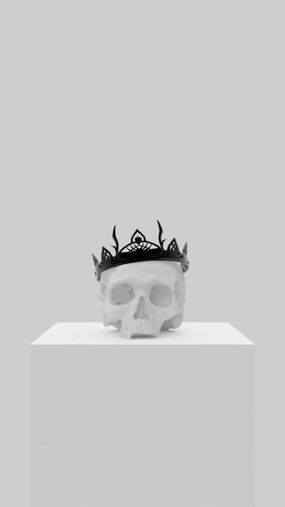 A skull with a crown on a pedestal