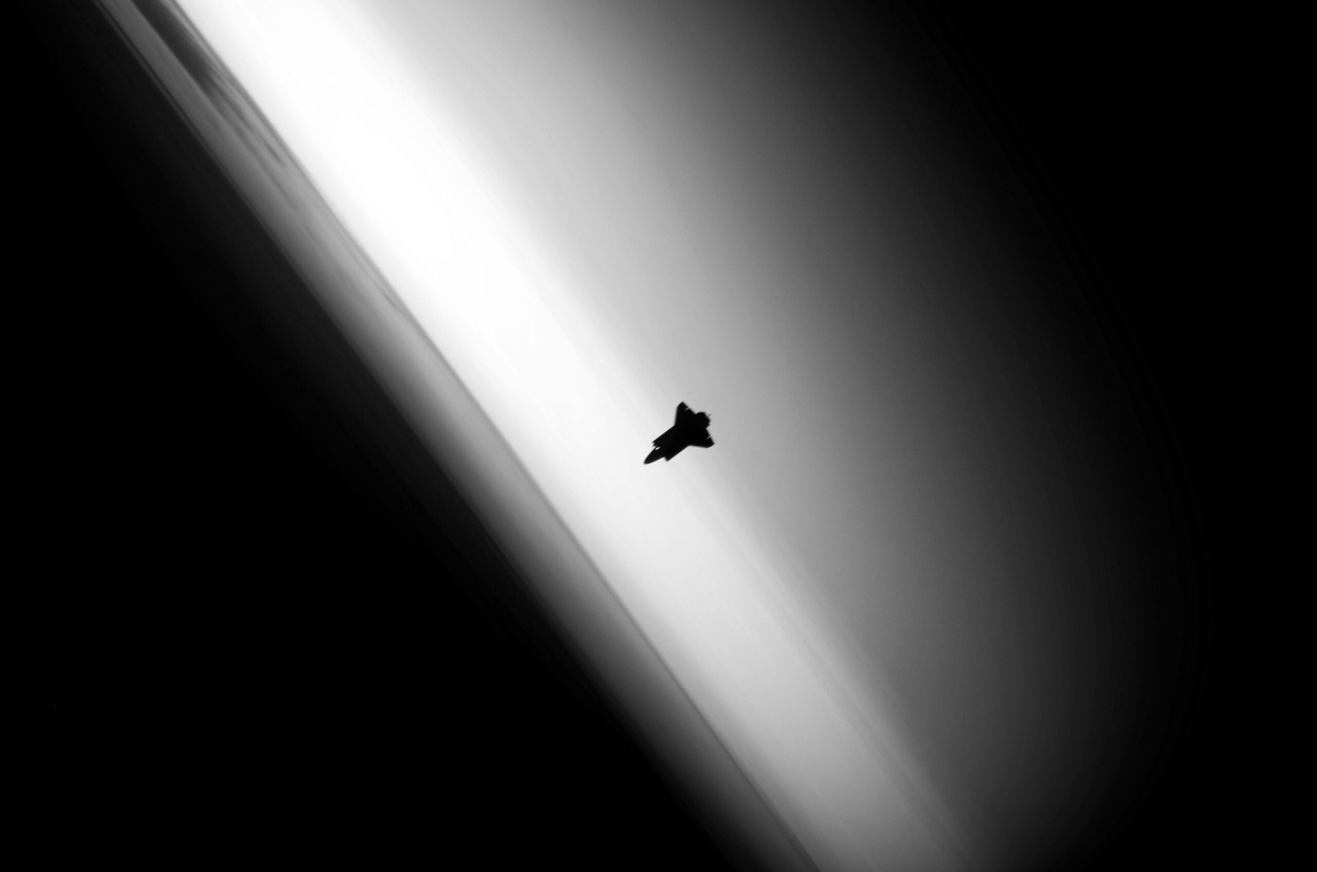 Space shuttle above Earth