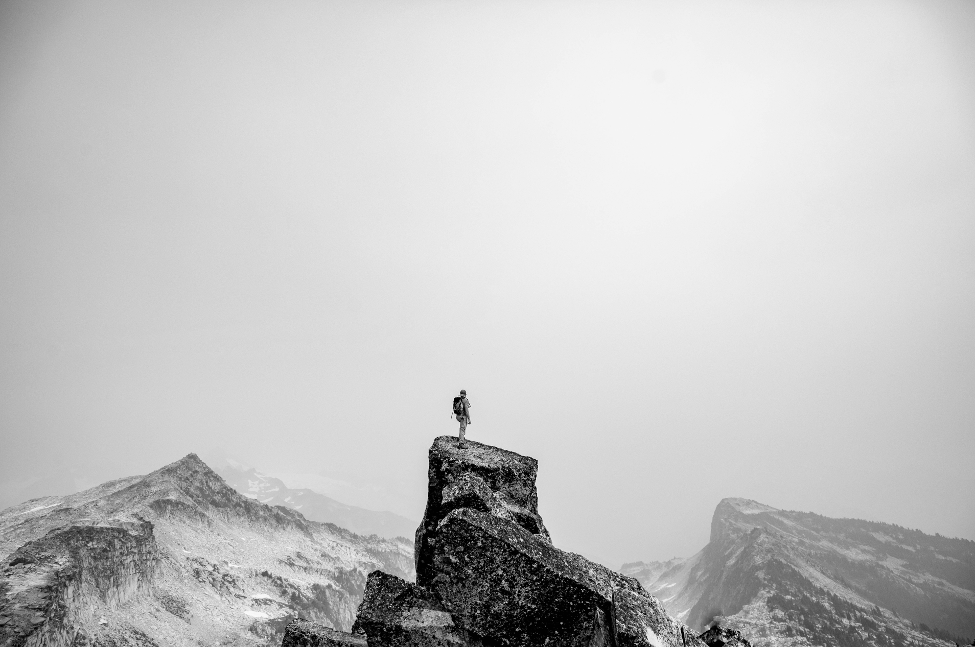 A person standing on top of a mountain